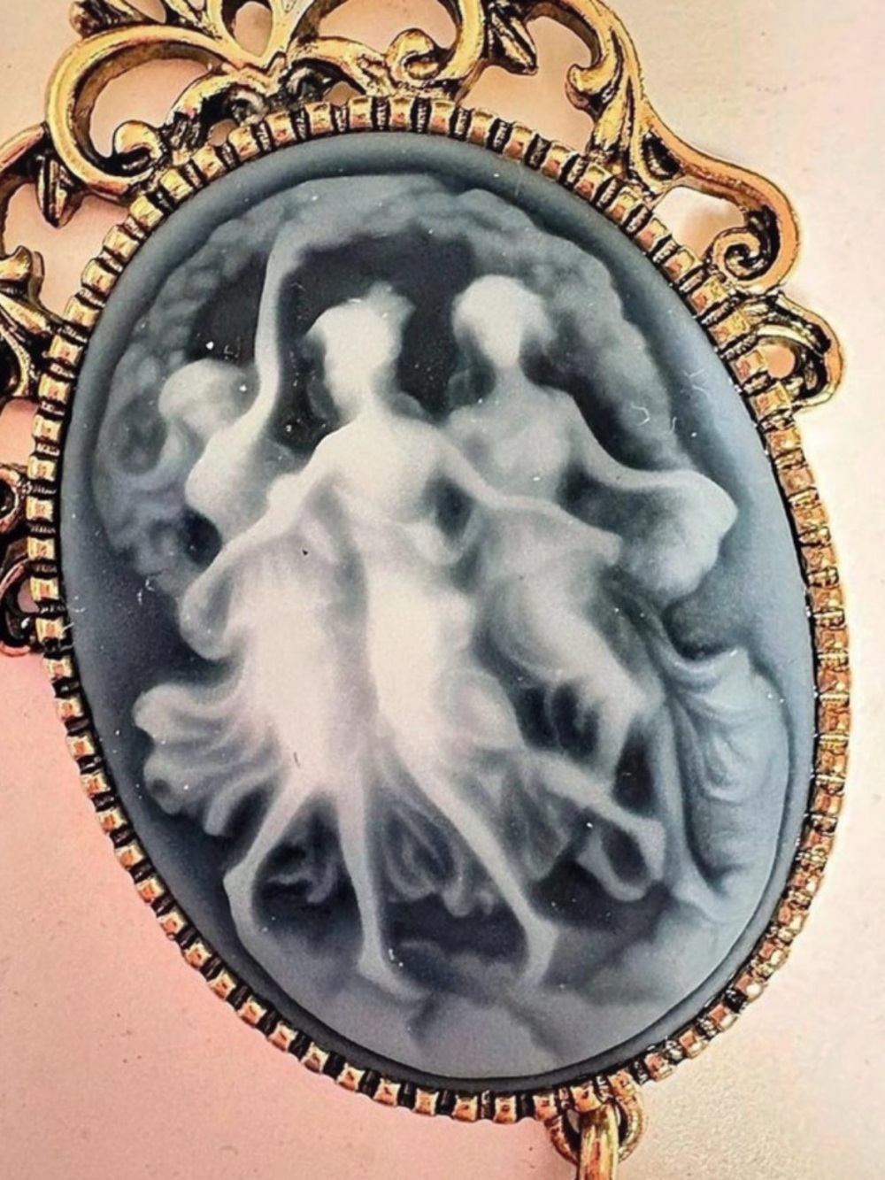 Vintage-Inspired Gold tone Cameo Necklace with White and Gray Motif